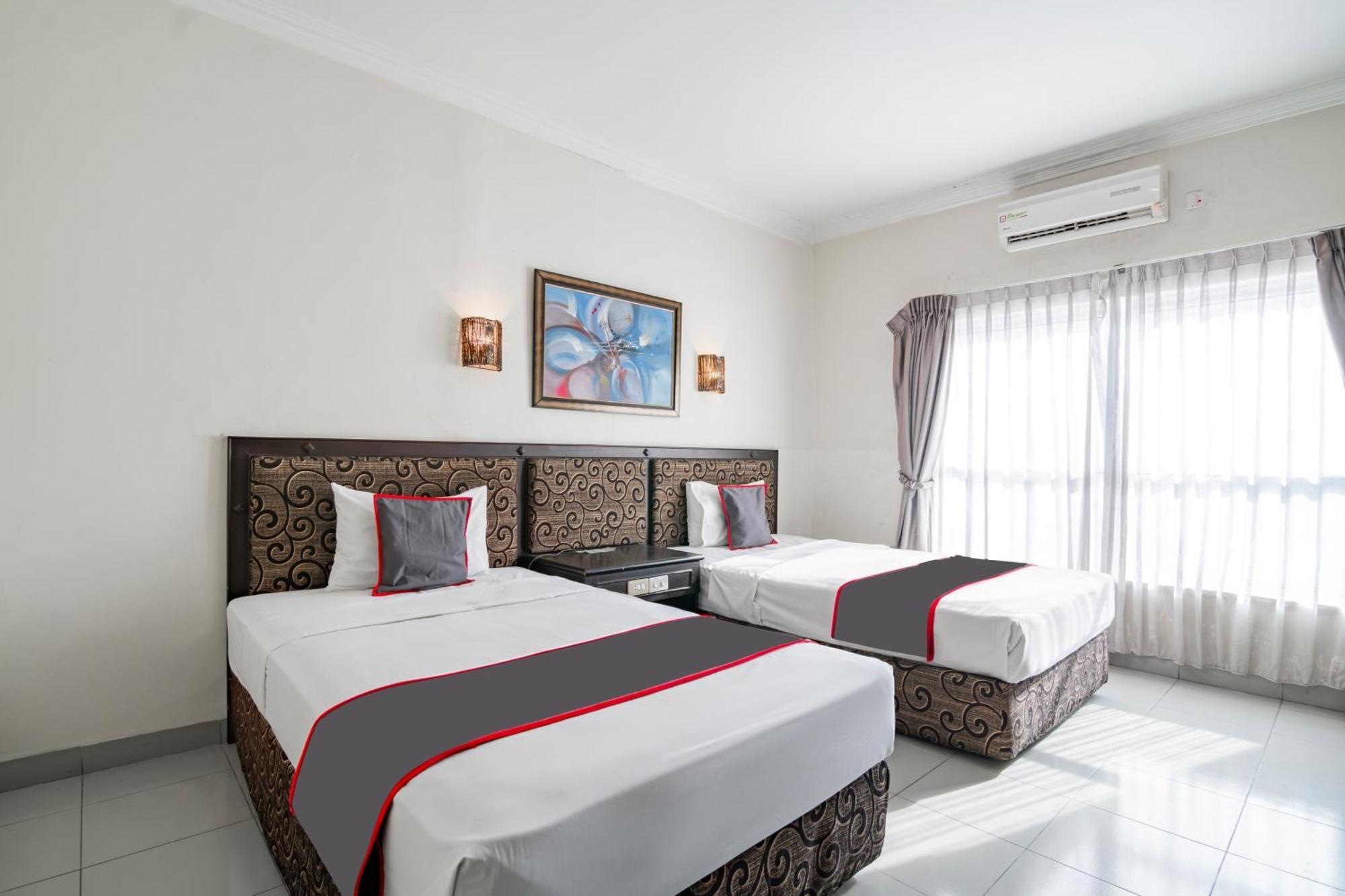 Collection O Senapelan Near Rsud Petala Bumi Formerly De Town Hotel Pekanbaru